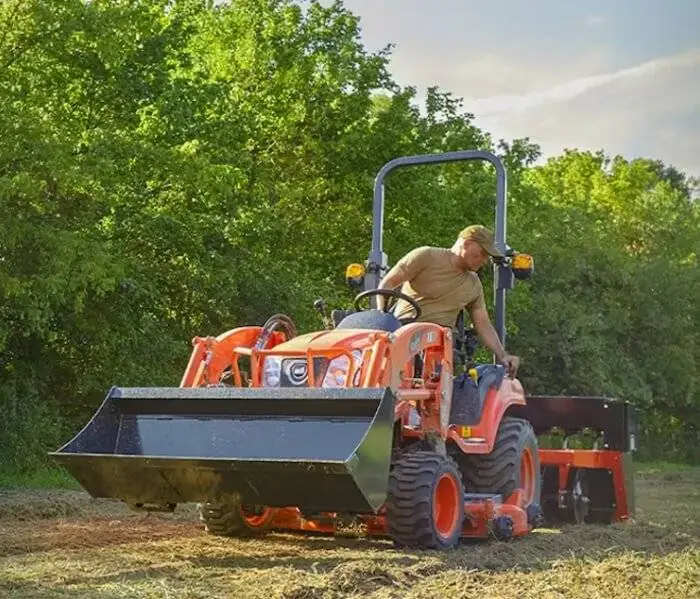 Outdoor Lawn Mowing with Riding Mower Man performing routine lawn maintenance with a riding mower.